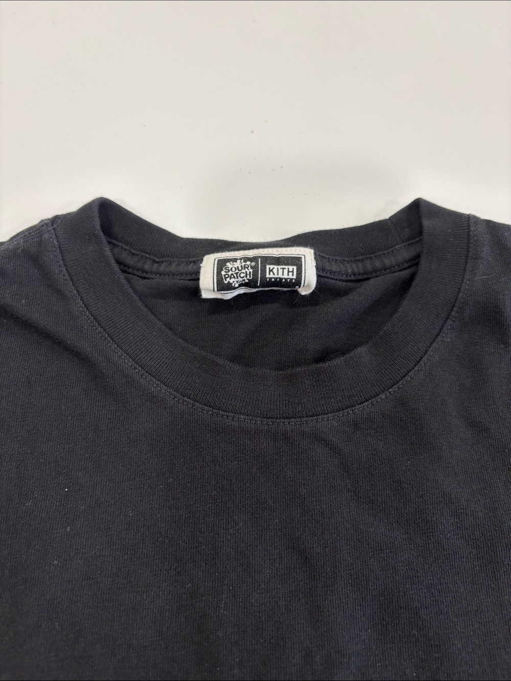 Kith Black Tee With White Label Graphic View 5
